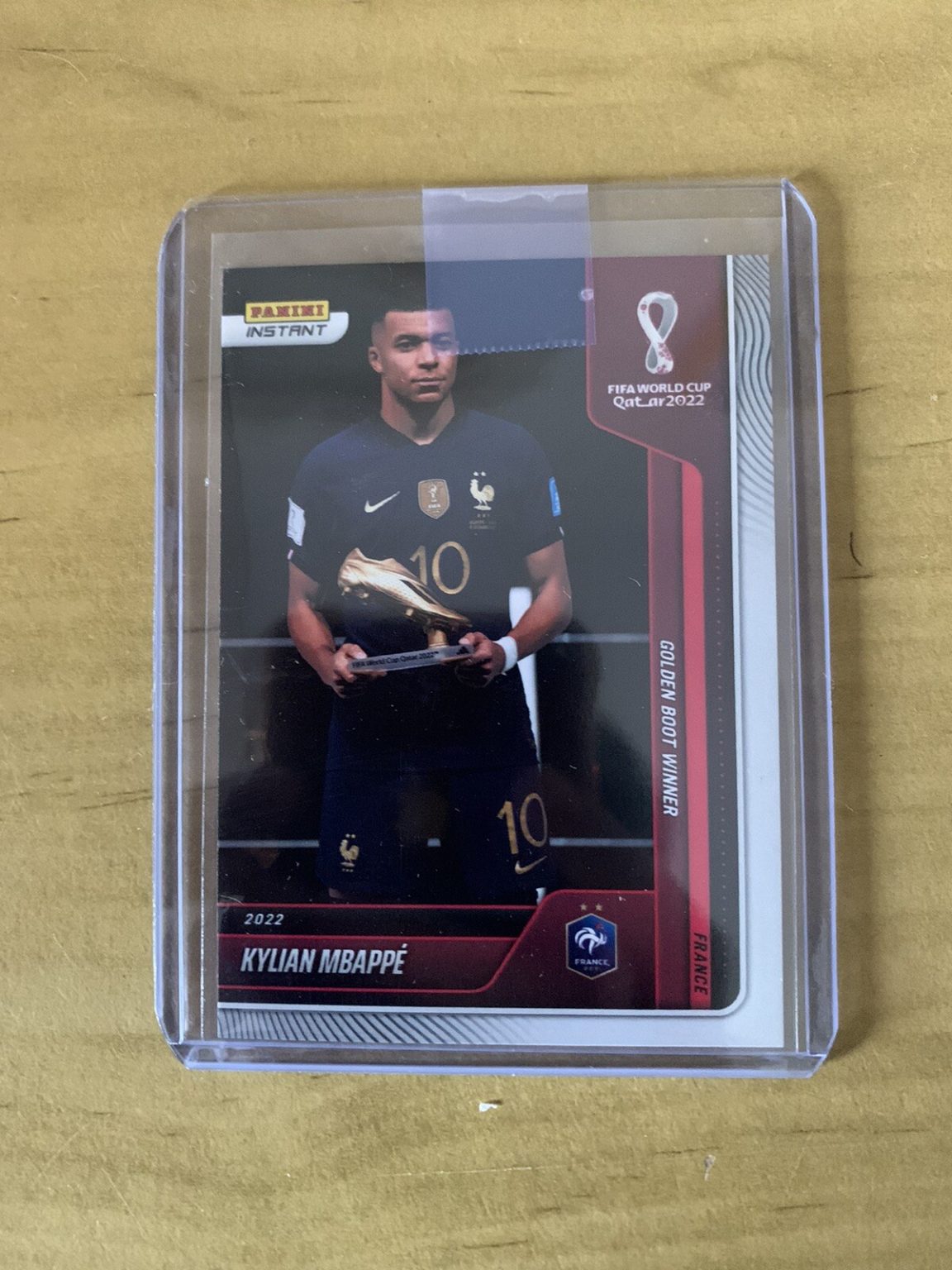 Carta Kylian Mbappé 133 Panini Instant Mundial Qatar 2022 sin graduar