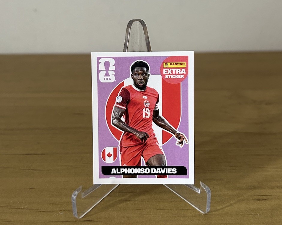Extra Sticker Rosa Alphonso Davies Panini FIFA World Cup 2026