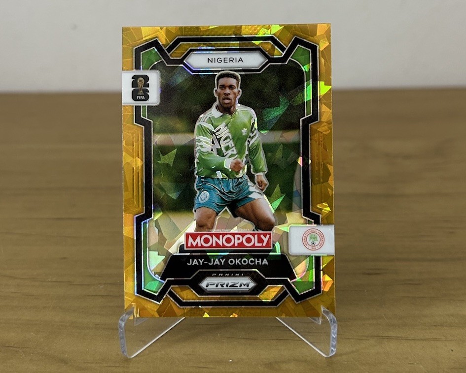 Carta Jay-Jay Okocha Gold Cracked Ice Panini Prizm Monopoly FIFA World Cup 2026 Nigeria