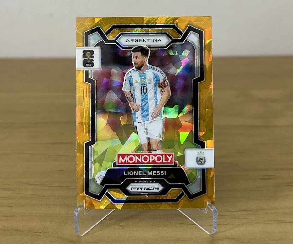 Carta Lionel Messi Gold Cracked Ice Panini Prizm Monopoly FIFA World Cup 2026