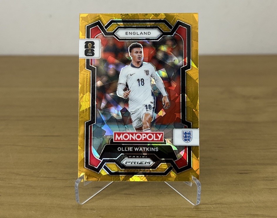 Carta Ollie Watkins Gold Cracked Ice Panini Prizm Monopoly FIFA World Cup 2026 Inglaterra