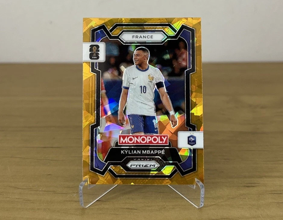 Carta Kylian Mbappé Gold Cracked Ice Panini Prizm Monopoly FIFA World Cup 2026