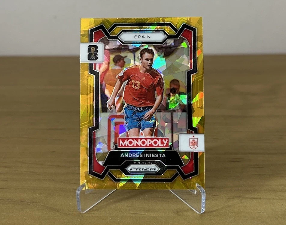 Carta Andrés Iniesta Gold Cracked Ice Panini Prizm Monopoly FIFA World Cup 2026